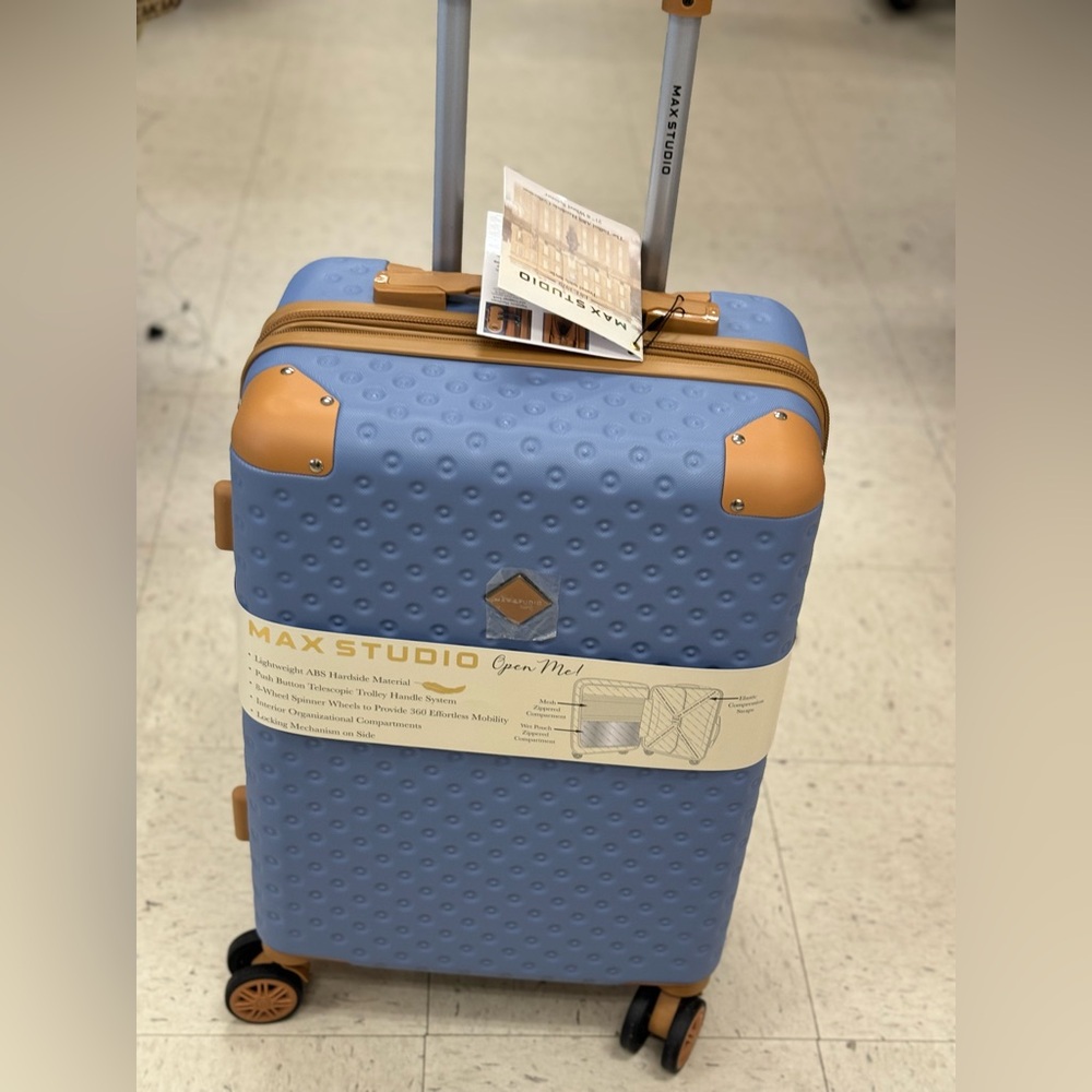 max studio luggage carry on 21” 8 wheel spinners